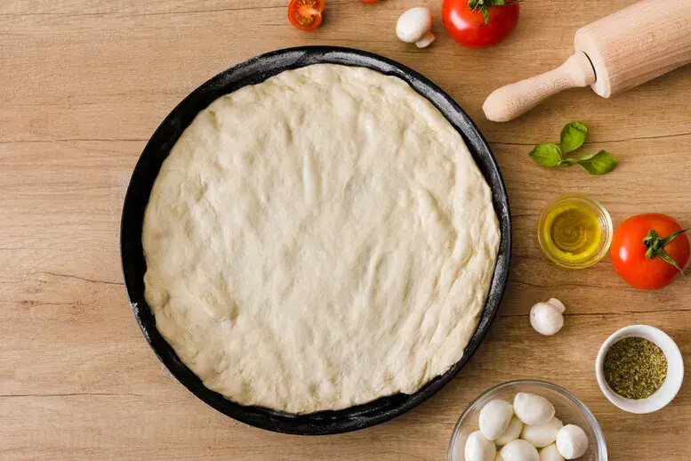 Jak uratować twarde ciasto na pizzę? Sprawdzone metody
