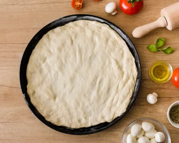 Jak uratować twarde ciasto na pizzę? Sprawdzone metody