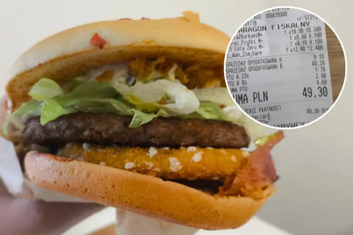 Drwal z chrzanem w burgerze, obok paragon z zakupami.