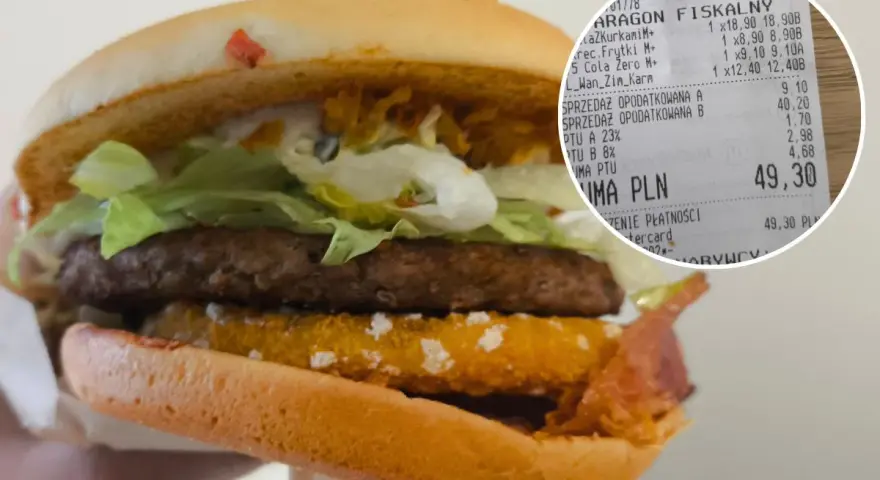 Drwal z chrzanem w burgerze, obok paragon z zakupami.